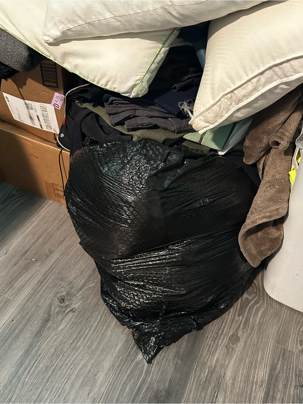 Large Black Trash Bag Filled with Clothes